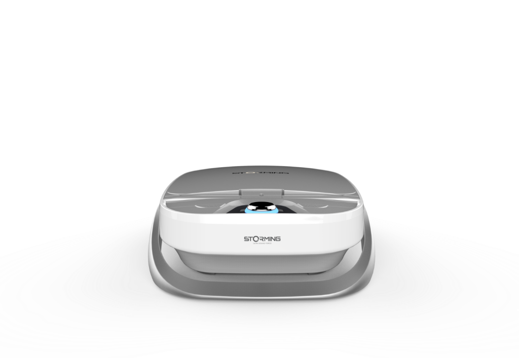 Compact aesthetic treatment device with blue accent