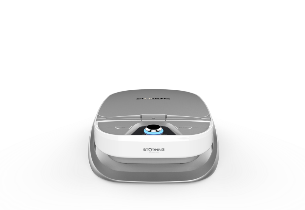 Compact aesthetic treatment device with rounded housing