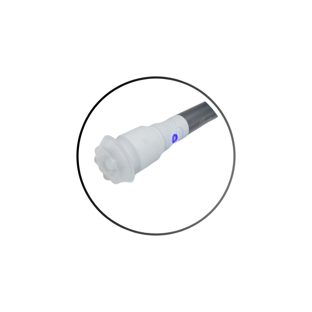 Aesthetic device handpiece with round metallic applicator tip