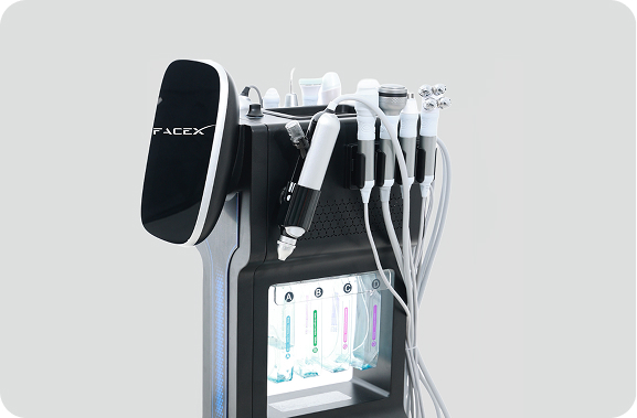 Close-up of a black multifunction aesthetic platform with handpieces