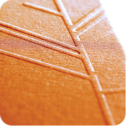 Macro close-up of an orange leaf's veined surface