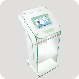 White aesthetic treatment device with touchscreen on a stand