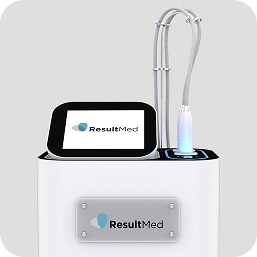 ResultMed treatment device base unit with handpiece on a cradle